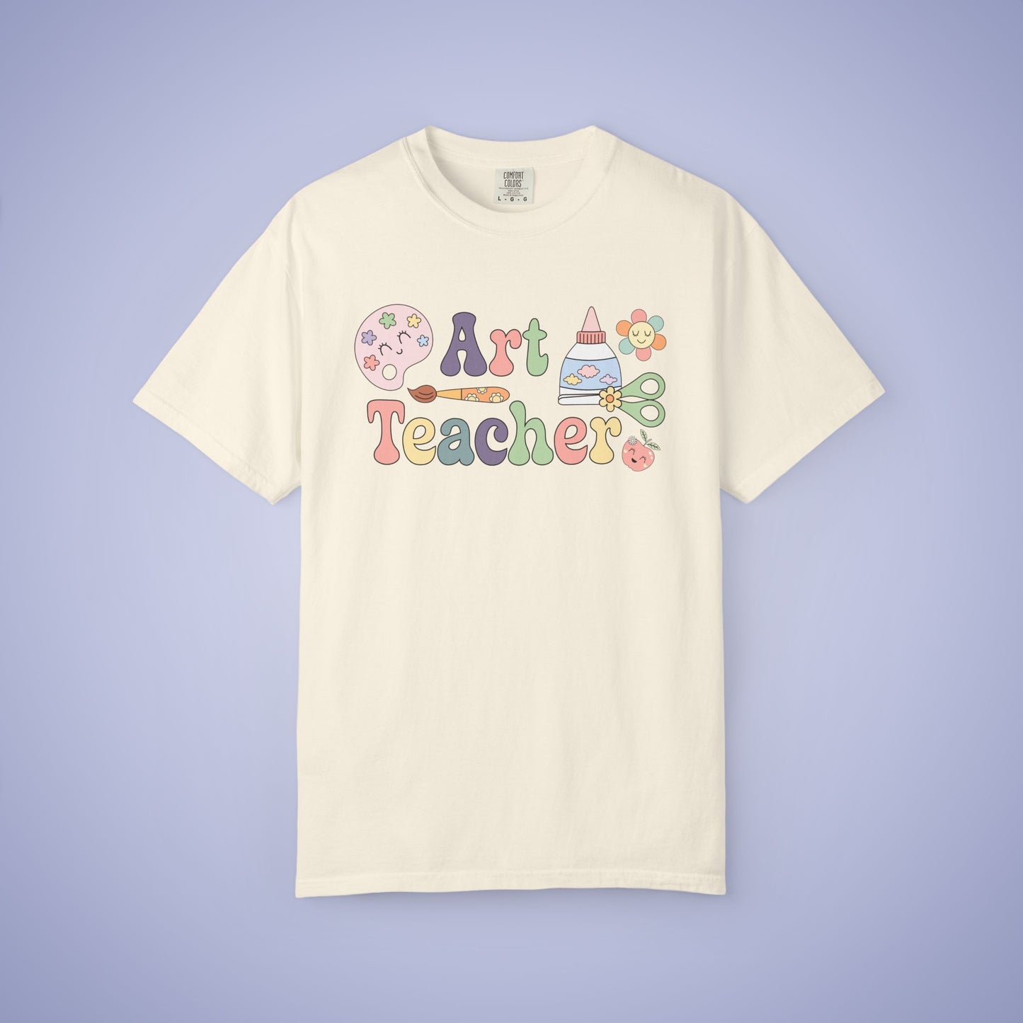 Cream t shirt with 'Art Teacher' text and colorful graphics on a ivory background
