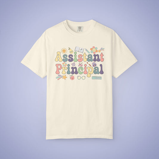 Beige t shirt with 'Assistant Principal' text on a cream background