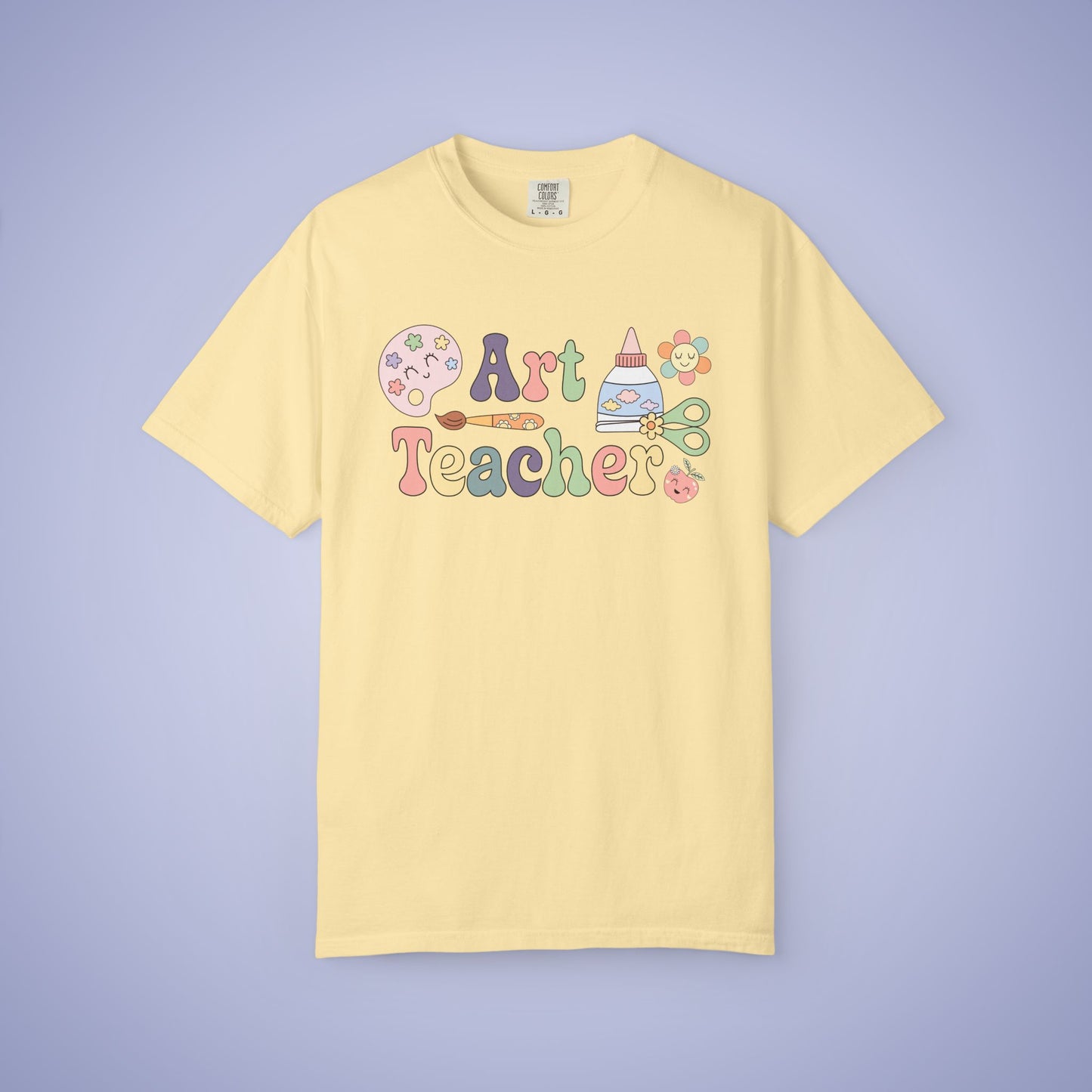 Yellow t shirt with 'Art Teacher' text and graphics on a yellow background
