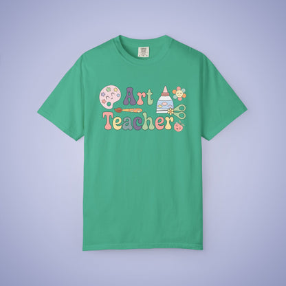 Green t shirt with 'Art Teacher' text and graphics on a green background