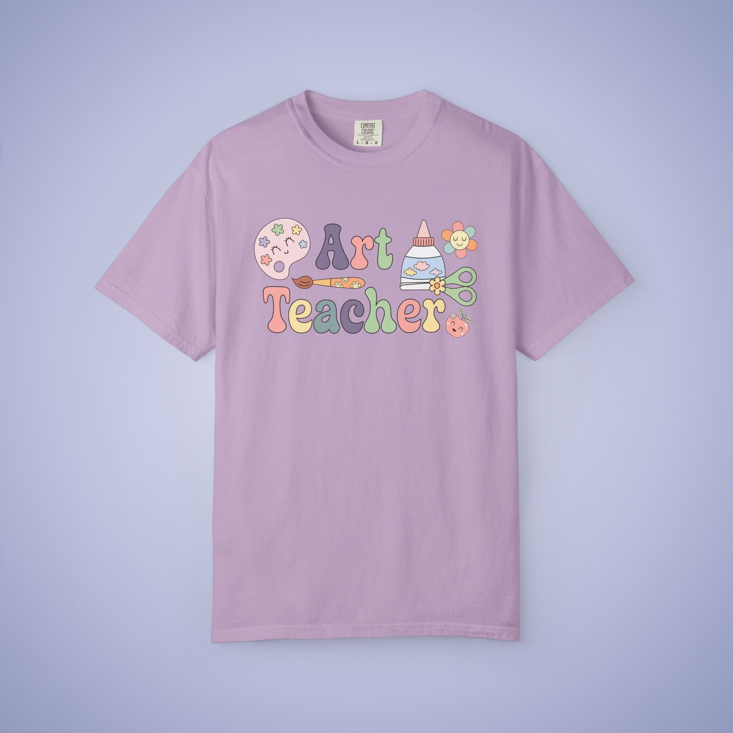 Purple t shirt with 'Art Teacher' text and graphics on a light purple background